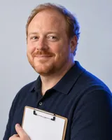 Portrait of Owen, the fictional persona of the GS Producer, an AI agent