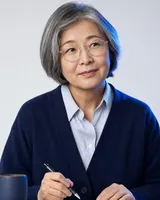 Portrait of Mei Lin, the fictional persona of the Make It Better agent, an AI agent