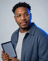 Portrait of Dwayne, the fictional persona of the Real User Monitor, an AI agent